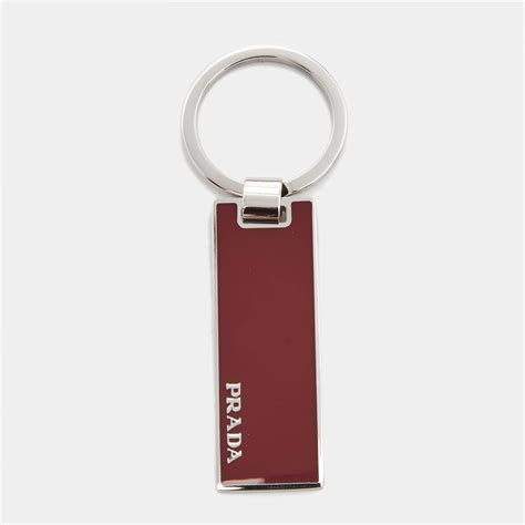 prada rectangle key chain enameled silver tone peonia red|PRADA Key Key Chains for Men for sale .